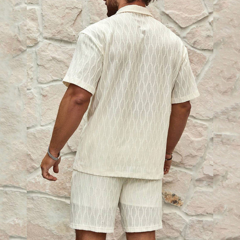 A comfortable summer men’s set featuring a simple, stylish button‑up shirt with matching lightweight shorts — perfect for beach days, holidays, and effortless everyday looks.