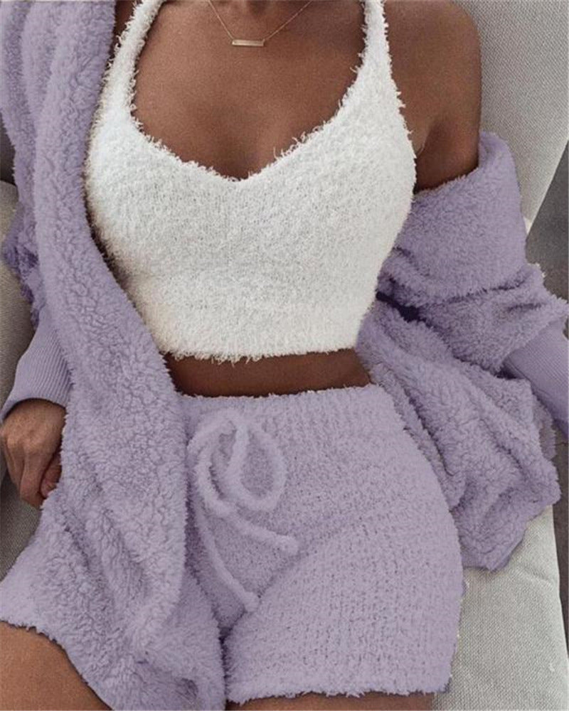A 3‑piece women’s loungewear set that blends soft comfort with simple elegance. A long‑sleeve crop top, a lightweight tank, and drawstring shorts for a relaxed, confident look at home.