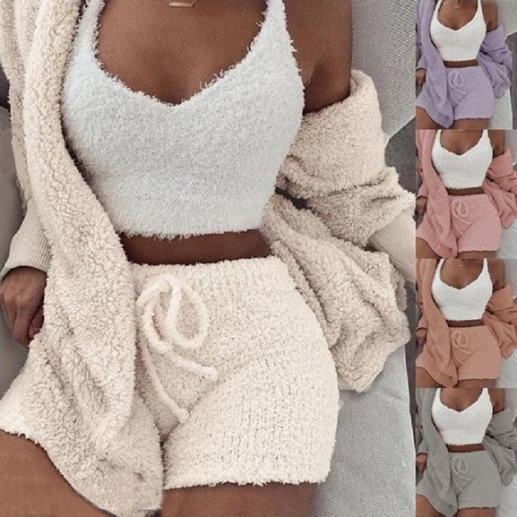 A 3‑piece women’s loungewear set that blends soft comfort with simple elegance. A long‑sleeve crop top, a lightweight tank, and drawstring shorts for a relaxed, confident look at home.