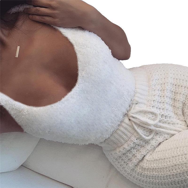 A 3‑piece women’s loungewear set that blends soft comfort with simple elegance. A long‑sleeve crop top, a lightweight tank, and drawstring shorts for a relaxed, confident look at home.