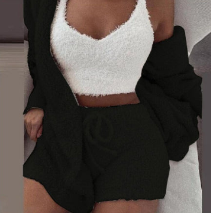 A 3‑piece women’s loungewear set that blends soft comfort with simple elegance. A long‑sleeve crop top, a lightweight tank, and drawstring shorts for a relaxed, confident look at home.