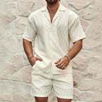 A comfortable summer men’s set featuring a simple, stylish button‑up shirt with matching lightweight shorts — perfect for beach days, holidays, and effortless everyday looks.